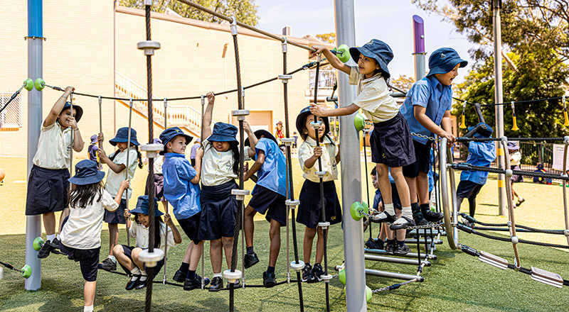 St Josephs Catholic Primary Kingwood students outside on play equipment