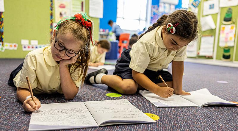 Girls learning at St Josephs Catholic Primary Kingwood