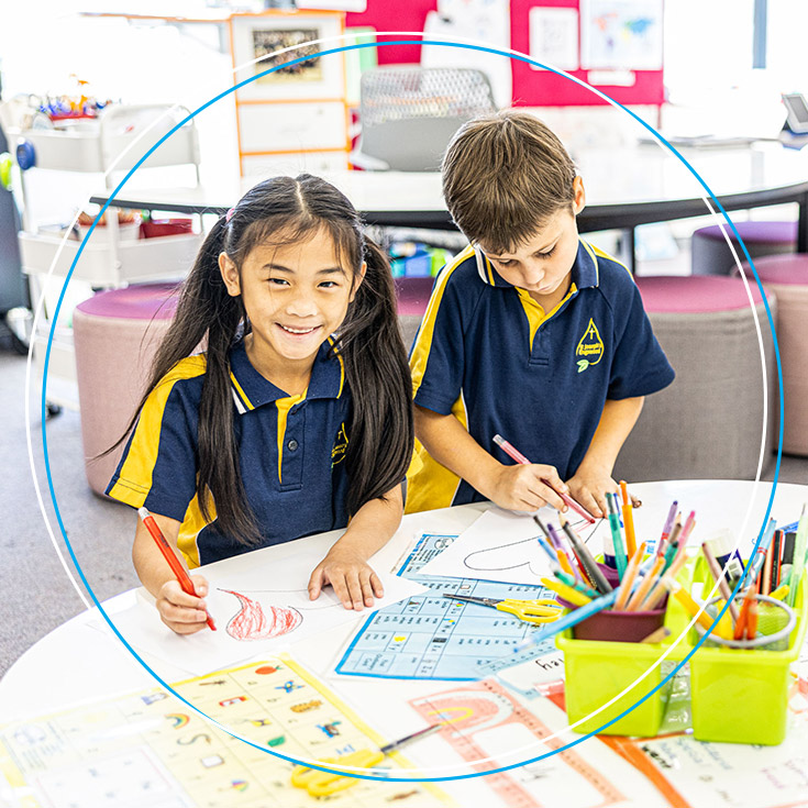Boy and girl learning at St Josephs Catholic Primary Kingwood