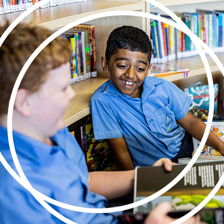 Boys reading in the St Josephs Catholic Primary Kingwood school library